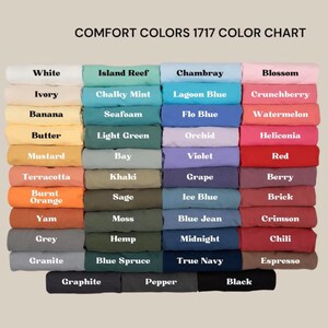 May include: A color chart titled "COMFORT COLORS 1717 COLOR CHART" displays a variety of fabric colors. Colors include White, Ivory, Banana, Butter, Mustard, Terracotta, Burnt Orange, Yam, Grey, Granite, Island Reef, Chalky Mint, Seafoam, Light Green, Bay, Khaki, Sage, Moss, Hemp, Blue Spruce, Graphite, Pepper, Black.