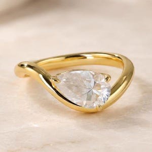 Pear Cut Moissanite Diamond Solitaire Ring, East West Curved Statement Ring