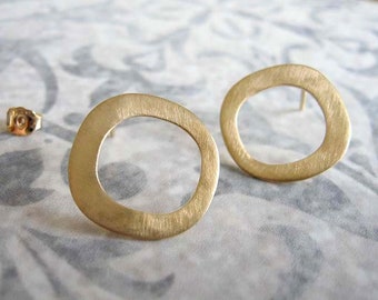 Gold circle stud earrings