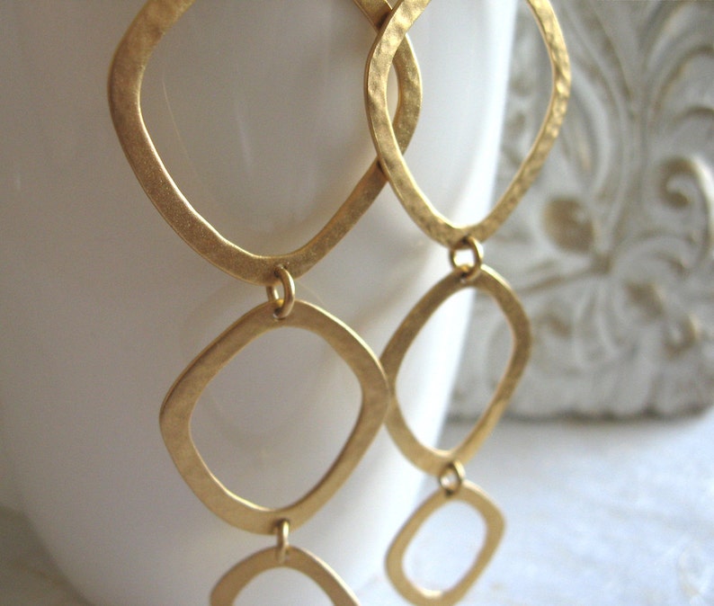 Long geometric gold earrings