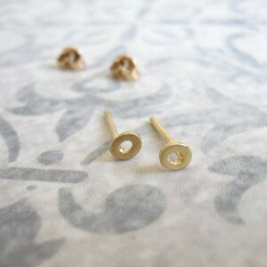 14k Solid gold tiny circle stud earrings , Asymmetric gold post earrings , Small everyday studs