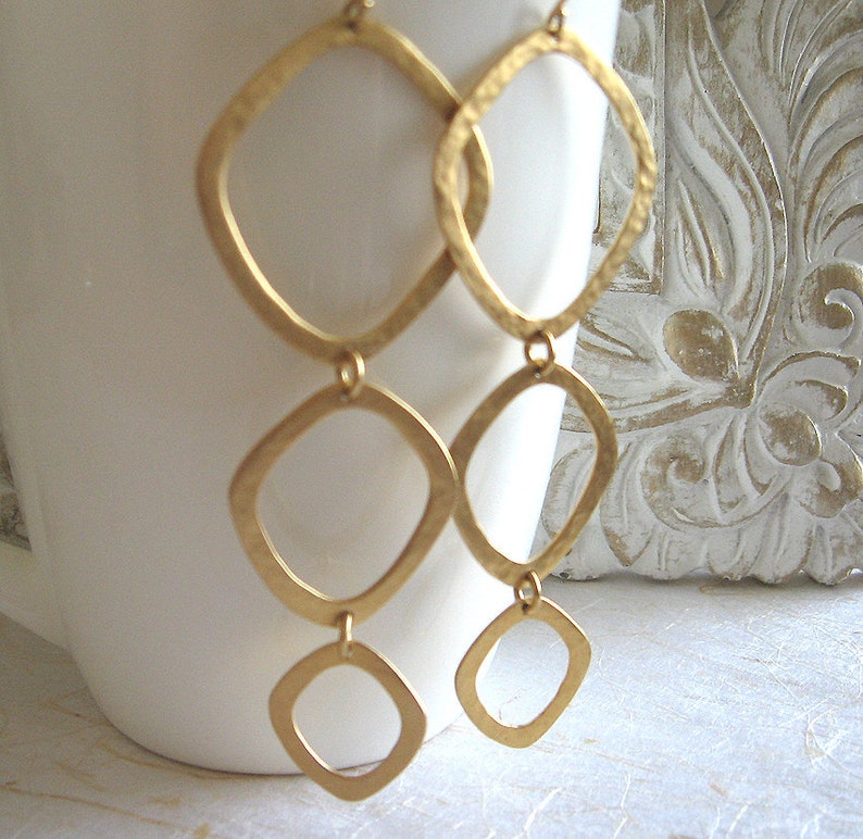 Long geometric gold earrings