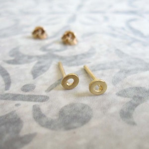 Tiny gold circle stud earrings , asymmetric gold post earrings , small everyday studs