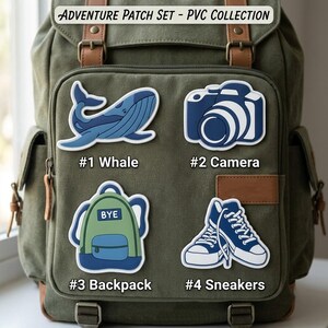 May include: An olive green canvas backpack featuring four PVC patches labeled ADVENTURE PATCH SET - PVC COLLECTION. The patches include a blue whale, a blue and white camera, a green backpack with the text BYE, and blue and white sneakers.