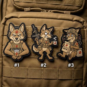 May include: Set of three tactical patches featuring cartoon coyote characters. Each patch has a different design: one holding a coffee cup, one with a rifle and coffee, and one with a bag of "Tactical Brew" coffee. The patches are numbered #1, #2, and #3.