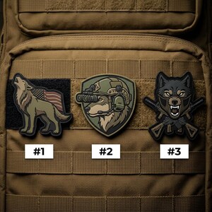 May include: Three tactical patches featuring wolf designs. One patch shows a howling wolf with an American flag, another depicts a wolf with night vision goggles, and the third has a wolf with crossed rifles. Each patch is numbered.