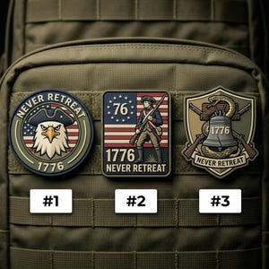 May include: Three embroidered patches with patriotic themes. One features an eagle and the text "Never Retreat" and "1776". Another shows a soldier and the American flag with "1776" and "Never Retreat". The third patch has a snake, bell, and rifles.