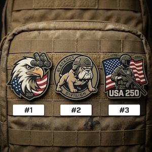 May include: Three tactical patches with patriotic themes. One features an eagle with binoculars, another a bulldog in a helmet, and the third a soldier with the American flag. Each patch has the text "USA 250" or "Blackout Division".