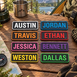 May include: Eight rectangular black patches with raised lettering in various colors. The names displayed are AUSTIN in white, JORDAN in blue, TRAVIS in orange, ETHAN in red, JESSICA in pink, BENNETT in purple, WESTON in yellow, and DALLAS in green.