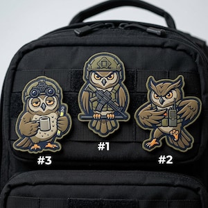 May include: Three embroidered patches featuring cartoon owls in military-themed designs. One owl holds a mug and pen, another holds a rifle, and the third holds a radio. The patches are affixed to a black backpack.