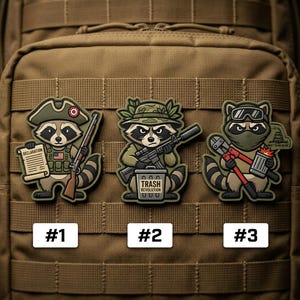 May include: Three embroidered patches featuring cartoon raccoons in military-style attire. One raccoon holds a rifle and a document labeled "Declaration", another holds a machine gun over a trash can, and the third holds tools and a beer.