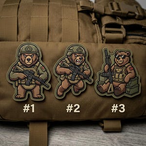 May include: Three tactical patches featuring cartoon bears in military gear. Each bear holds a rifle and wears a helmet and tactical vest. The patches are numbered #1, #2, and #3. One bear has sunglasses and a "DO NOT PET" patch.