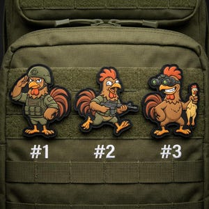 May include: Three embroidered patches featuring cartoon chickens in military attire. The chickens are in various poses, including saluting, holding a rifle, and using binoculars. Each patch has a number: #1, #2, and #3. The patches are on a green background.