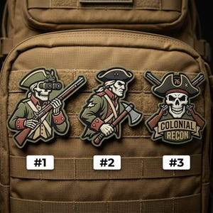 May include: Three embroidered patches featuring colonial-era figures. One depicts a skeleton with a rifle and night vision goggles, another a man with an axe, and the third a skull with crossed rifles and the text "COLONIAL RECON". The patches are in shades of green, red, and brown.