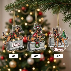 May include: Three clear acrylic Christmas ornaments featuring illustrations of German Shepherd dogs wearing tactical vests. Each ornament displays a name: Liam, Ava, or Oliver, and includes festive elements like a candy cane, gift, or wreath.