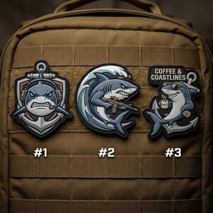 May include: Three embroidered patches featuring shark designs. One shark wears a headset, another holds a rifle, and the third enjoys coffee with sunglasses. Each patch is affixed to a brown backpack. The patches are labeled with numbers.
