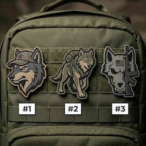 May include: Three wolf-themed patches are displayed on a green backpack. The patches feature detailed wolf designs in various styles, including one wearing a cap, another with a backpack, and a third with a rifle. Each patch is numbered for identification.