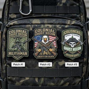 May include: Three embroidered patches with military-themed designs. The patches feature the text "COLONIAL GHOST RECON" and various illustrations, including a gas mask-wearing figure, an eagle with rifles, and a skull with crossed axes. The patches are labeled "Patch #1", "Patch #2", and "Patch #3".