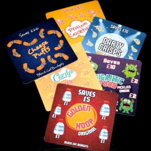 May include: A collection of five square savings challenge cards featuring colourful snack-themed graphics. Each card displays specific savings goals in British pounds, including Cheese Puffs, Prawn Cocktail, Party Crisps, Curlys, and Golden Hoop Original.