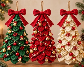 May include: Three hanging Christmas tree ornaments crafted from crocheted leaves in green, red, and cream. Each tree is topped with a large red crocheted bow and a jute loop, and decorated with small gold bells, red baubles, and pearl-like beads.