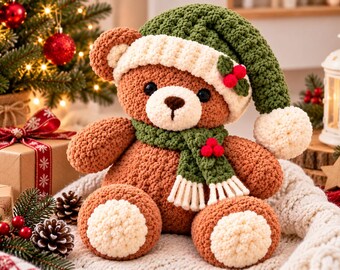 May include: A brown crocheted teddy bear wearing a green and white knit hat with a pom-pom and a matching green scarf. The bear features cream-colored accents on its ears, muzzle, and feet, and is decorated with small red holly berries.