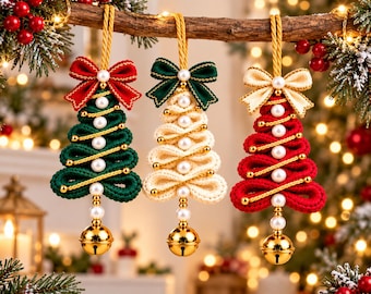 May include: Three hanging Christmas tree ornaments made of folded fabric ribbon in green, cream, and red. Each tree is topped with a fabric bow, decorated with white faux pearls and gold beads, and features a gold jingle bell at the bottom.