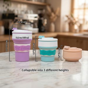 Size and dimension guide for the 11.8 oz personalized collapsible silicone water cup. Shows the foldable travel bottle adjusting to 3 heights: 5.3 inches, 4.1 inches, and a compact 2.5 inches. Features examples of the custom engraved name band with cute icons.