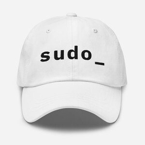 May include: White baseball cap with the word "sudo_" printed in black. The cap has a curved brim and an adjustable strap at the back. A simple, casual hat.