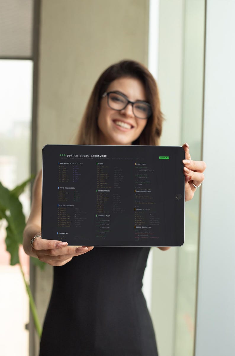 May include: A person holding a black tablet displaying a Python cheat sheet. The screen shows code snippets and the text "python cheat_sheet.pdf". The person is wearing glasses and a black dress.