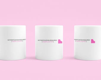 May include: Three white ceramic mugs featuring the black text "AUTHENTICATION REQUIRED: [INSERT_COFFEE]" and a small pink graphic icon. The mugs are arranged in a row, each with a side handle, displaying the same printed design on the front surface.