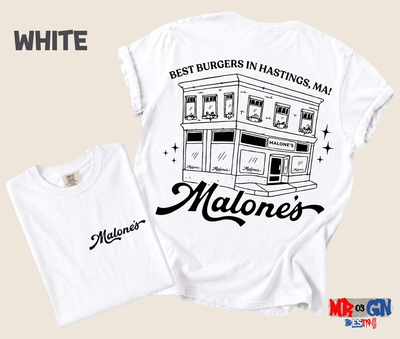 A white t-shirt with a graphic design depicting a building and the text "Malones" written on it.