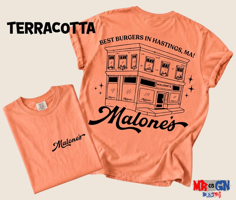 a t-shirt with a graphic design of a building and the text "Malone's" printed on it.