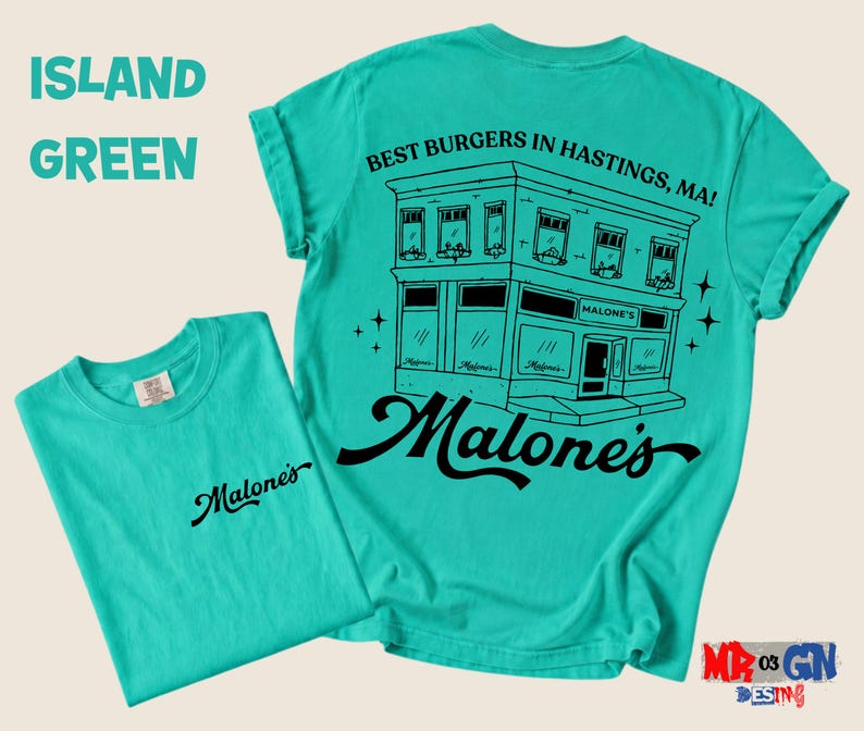 A turquoise t-shirt with a graphic design of a building and text, along with the text "Malone's" and "Best Burgers in Hastings, MA!" printed on it.