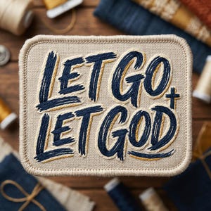 May include: Embroidered patch with the words "LET GO LET GOD" in navy blue script. The patch has a beige background and a stitched border. A small cross is next to the word "GOD".