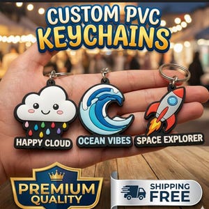 May include: Custom PVC keyrings with a cloud, ocean wave, and rocket ship design. The keyrings have metal rings and the text "HAPPY CLOUD", "OCEAN VIBES", and "SPACE EXPLORER".