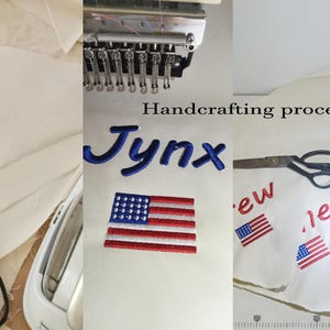May include: An embroidery machine stitching the name Jynx in blue thread above a red, white, and blue American flag patch on white fabric. Black scissors, a sewing machine, and the text Handcrafting process are visible in this production scene.