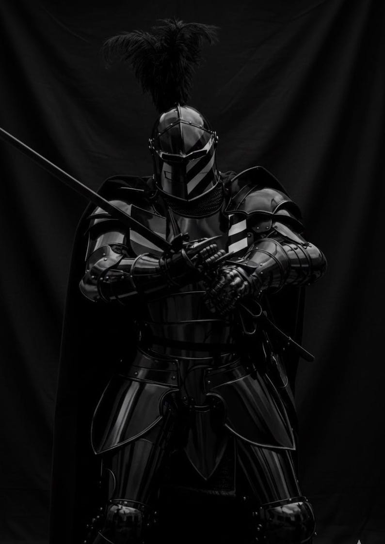 May include: A black and white image of a knight in full armor, holding a sword. The armor is highly polished, reflecting the light. A plume of feathers adorns the helmet. The knight is posed in a strong, confident stance.