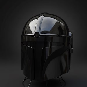 May include: A shiny black helmet with a rounded crown and sharp angles. The helmet features a visor and cheek plates, and it rests on a black wire stand. The design hints at a futuristic or science fiction aesthetic.