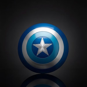 May include: A circular shield in blue, silver, and white, featuring a central silver star. The shield has concentric rings of different blue and silver tones. The shield is round and appears to be made of metal.