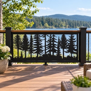 May include: A black metal railing panel featuring a laser-cut silhouette of a dense pine forest. The rectangular panel is mounted between two black posts and topped with a wooden handrail, showcasing a detailed evergreen tree design.