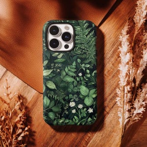 Bring a timeless natural elegance to your phone with this vintage botanical case 🌿🌸✨ Featuring dark green floral illustrations inspired by classic botanical art, it creates a refined and earthy aesthetic. High-quality printing ensures rich, fade-resistant details, while the durable structure protects against everyday drops and scratches. Lightweight and comfortable to hold, it’s perfect for lovers of nature, vintage science art, and sophisticated floral designs.