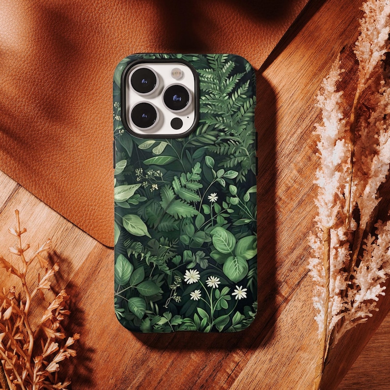 Bring a timeless natural elegance to your phone with this vintage botanical case 🌿🌸✨ Featuring dark green floral illustrations inspired by classic botanical art, it creates a refined and earthy aesthetic. High-quality printing ensures rich, fade-resistant details, while the durable structure protects against everyday drops and scratches. Lightweight and comfortable to hold, it’s perfect for lovers of nature, vintage science art, and sophisticated floral designs.