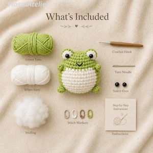 May include: A crochet kit with a green and white frog, green and white yarn, stuffing, stitch markers, safety eyes, a crochet hook, and instructions. The text "What's Included" is at the top.