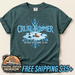 May include: Teal-colored t-shirt with the text "CRUEL SUMMER" in blue, featuring a snowman melting in a puddle. The shirt also includes the text "THE SHAPE OF YOUR BODY. IT'S NEW."