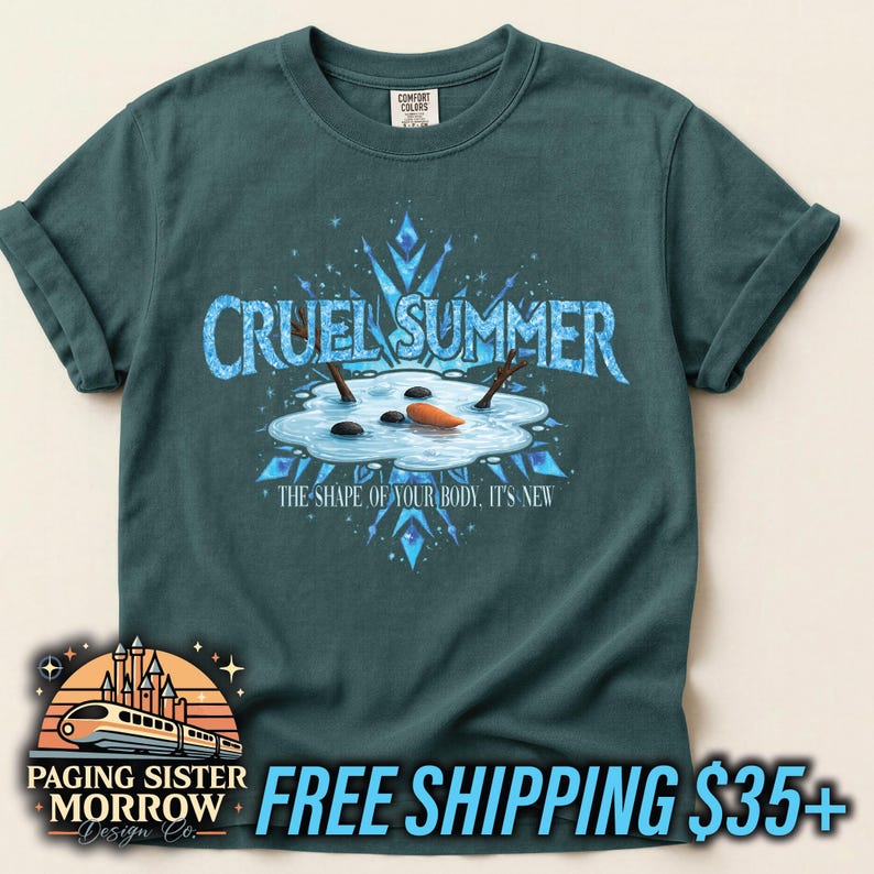 May include: Teal-colored t-shirt with the text "CRUEL SUMMER" in blue, featuring a snowman melting in a puddle. The shirt also includes the text "THE SHAPE OF YOUR BODY. IT'S NEW."