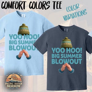 May include: Two Comfort Colors t-shirts, one light blue and one navy, with the text "YOO HOO! BIG SUMMER BLOWOUT." Each shirt features a graphic of a winter hat and hands. The words "COMFORT COLORS TEE" and "COLOR VARIATIONS" are at the top.