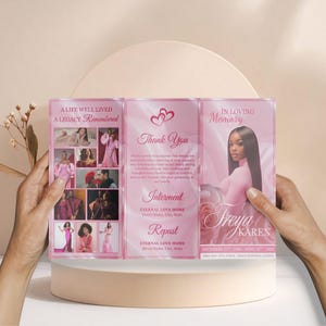 May include: A pink memorial brochure held by hands, featuring photos and text. The brochure includes the phrases "A Life Well Lived, A Legacy Remembered", "Thank You", and "In Loving Memory". It also lists dates and a name.