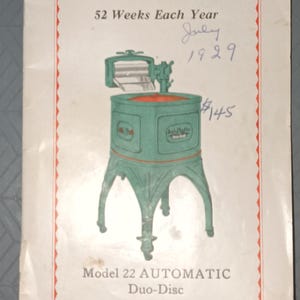 May include: Vintage advertisement for the Model 22 Automatic Duo-Disc washing machine. The brochure features a green and red illustration of the washer, with text that reads "I Have Come to Help You." Handwritten notes indicate the year 1929 and a price of $145.