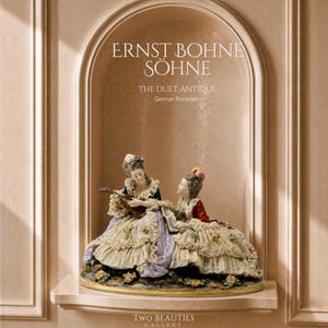 May include: An Ernst Bohne Söhne porcelain figurine titled The Duet, Antique, featuring two figures in period attire. One figure plays a stringed instrument while the other listens. They wear elaborate ruffled dresses with floral accents.