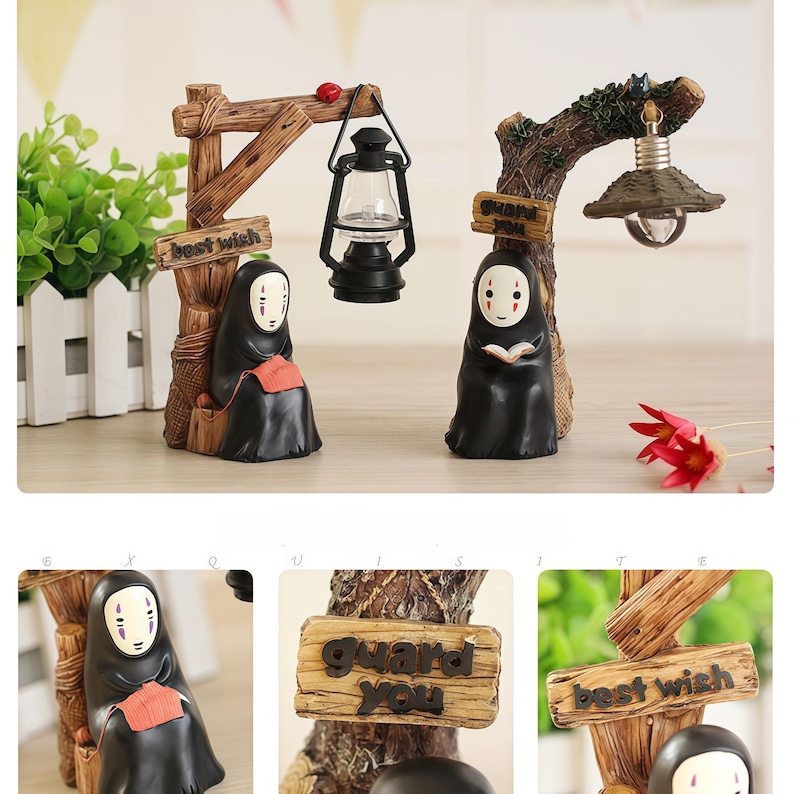 May include: Two decorative figurines featuring characters from Spirited Away. One figure is seated beneath a wooden structure with a lantern and the words "best wish." The other figure is under a tree with a light and the words "guard you."